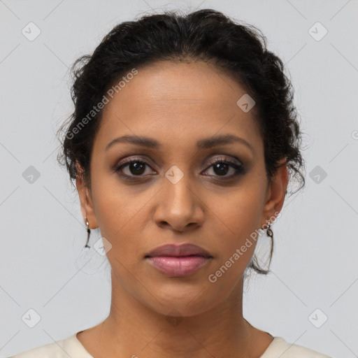 Joyful latino young-adult female with short  brown hair and brown eyes