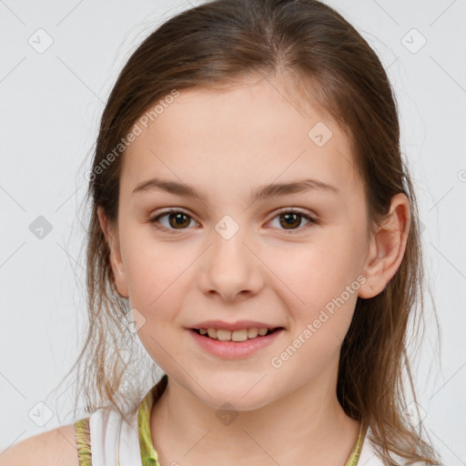 Joyful white child female with medium  brown hair and brown eyes