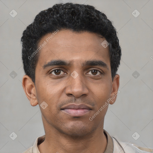 Neutral black young-adult male with short  black hair and brown eyes