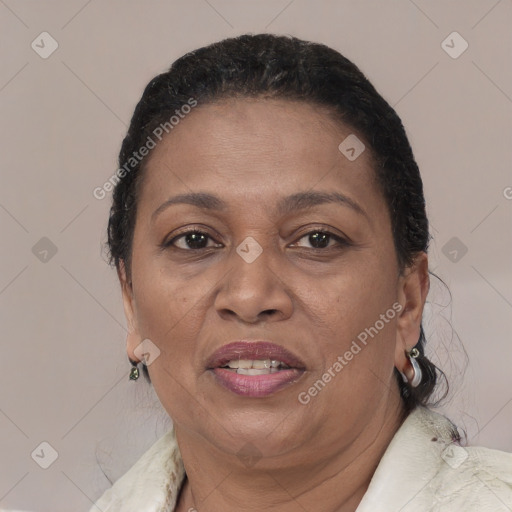 Joyful black adult female with short  brown hair and brown eyes