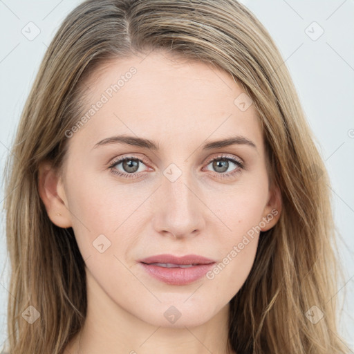 Joyful white young-adult female with long  brown hair and blue eyes