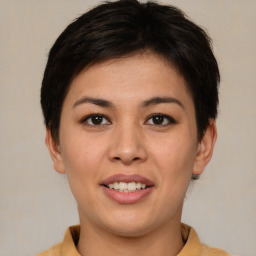 Joyful asian young-adult female with short  brown hair and brown eyes