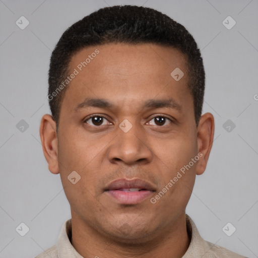 Joyful latino young-adult male with short  brown hair and brown eyes