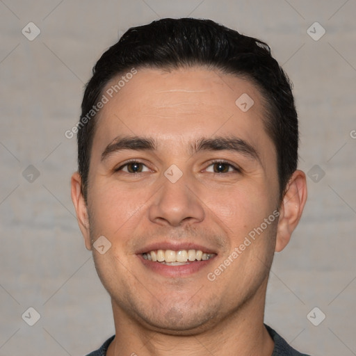 Joyful white young-adult male with short  black hair and brown eyes