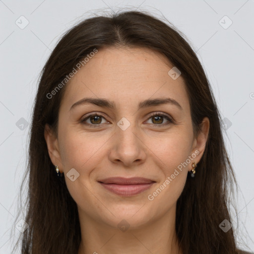 Joyful white young-adult female with long  brown hair and brown eyes