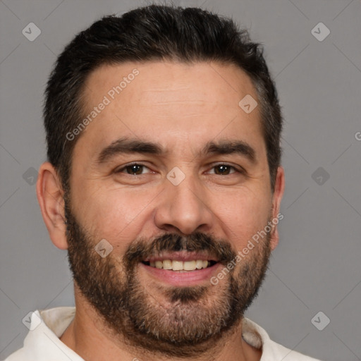 Joyful white adult male with short  brown hair and brown eyes