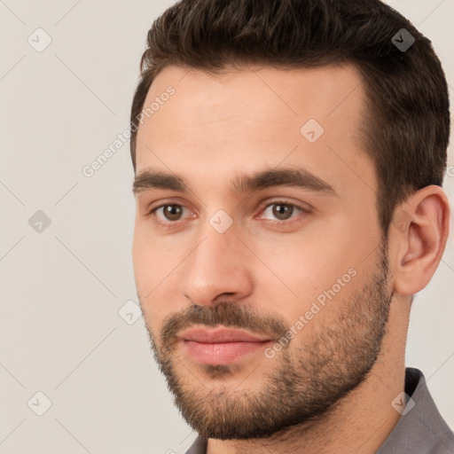 Neutral white young-adult male with short  brown hair and brown eyes