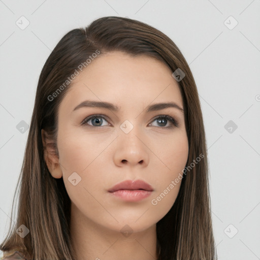 Neutral white young-adult female with long  brown hair and brown eyes