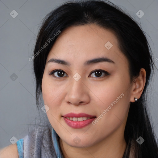 Joyful asian young-adult female with long  brown hair and brown eyes