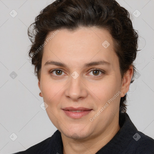 Joyful white adult female with short  brown hair and brown eyes