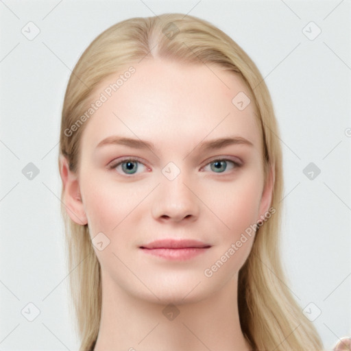 Joyful white young-adult female with long  brown hair and blue eyes