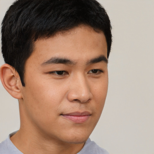 Neutral asian young-adult male with short  brown hair and brown eyes