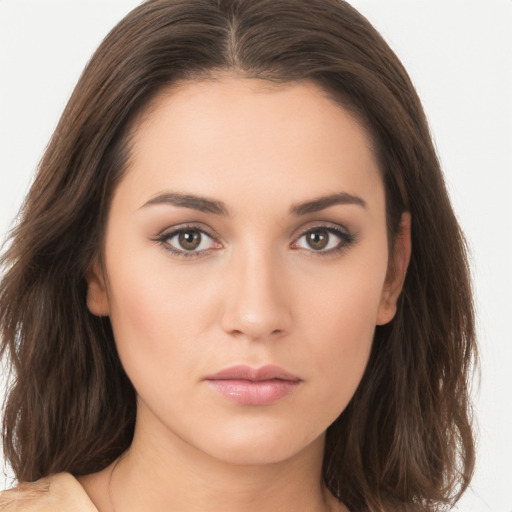 Neutral white young-adult female with long  brown hair and brown eyes