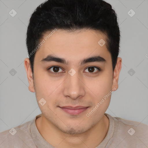 Joyful asian young-adult male with short  brown hair and brown eyes