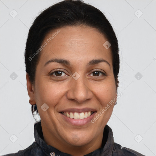 Joyful white adult female with long  brown hair and brown eyes