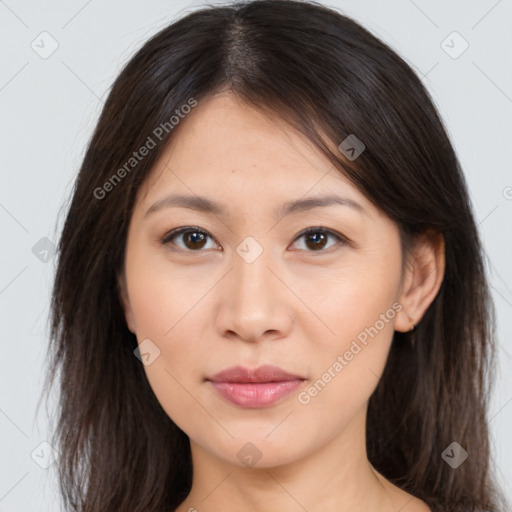 Joyful asian young-adult female with medium  brown hair and brown eyes