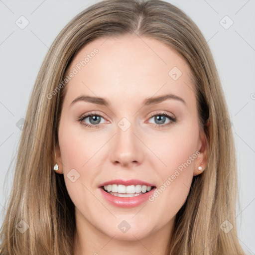 Joyful white young-adult female with long  brown hair and grey eyes