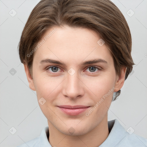 Joyful white young-adult female with short  brown hair and grey eyes