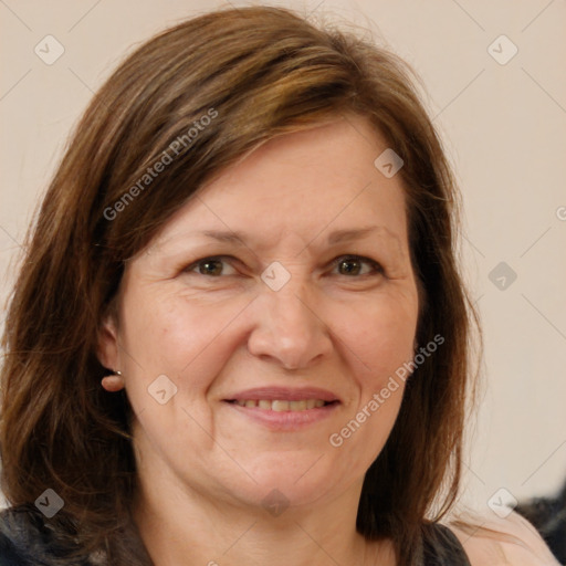 Joyful white adult female with medium  brown hair and grey eyes