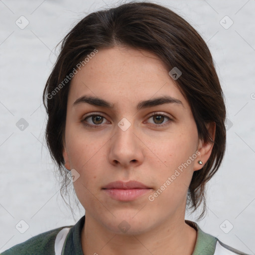 Neutral white young-adult female with medium  brown hair and brown eyes