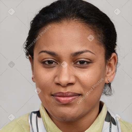 Joyful latino adult female with short  brown hair and brown eyes