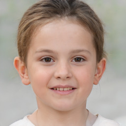 Joyful white child female with short  brown hair and brown eyes