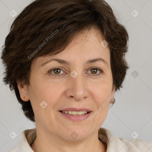 Joyful white adult female with short  brown hair and brown eyes