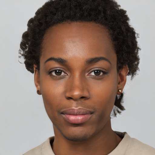 Neutral black young-adult female with short  black hair and brown eyes