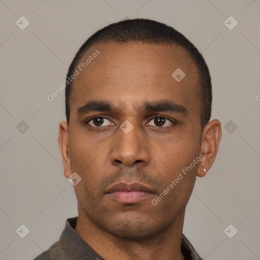 Neutral latino adult male with short  black hair and brown eyes
