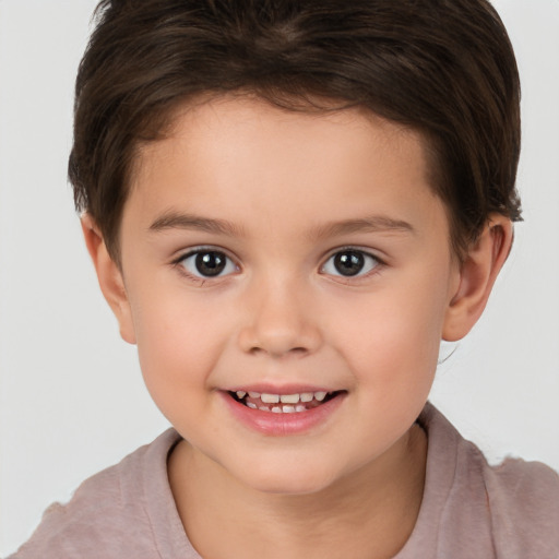 Joyful white child female with short  brown hair and brown eyes