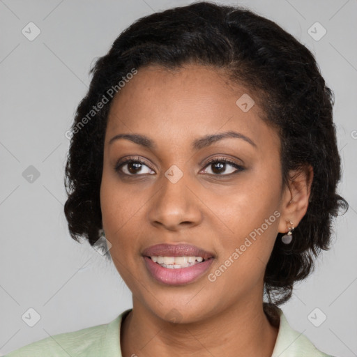 Joyful black young-adult female with medium  brown hair and brown eyes