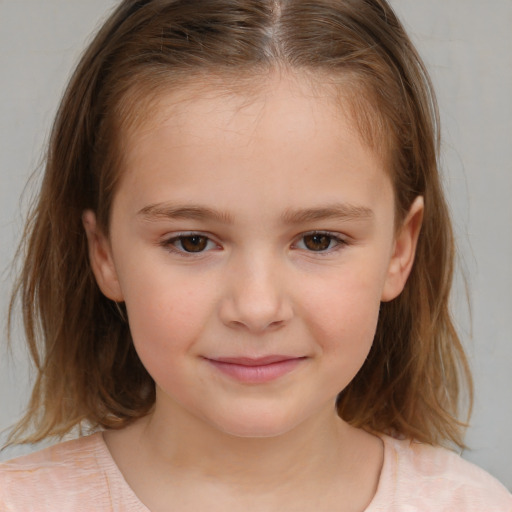 Joyful white child female with medium  brown hair and brown eyes