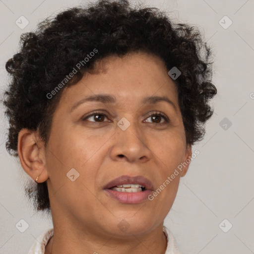 Joyful black adult female with short  brown hair and brown eyes