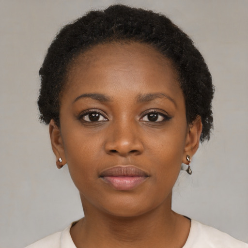 Neutral black young-adult female with short  brown hair and brown eyes