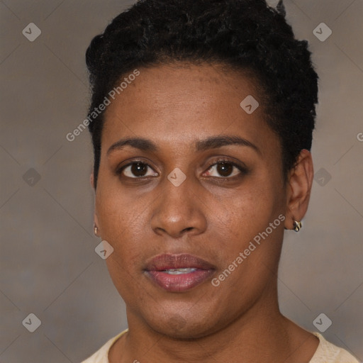 Joyful black young-adult female with short  brown hair and brown eyes