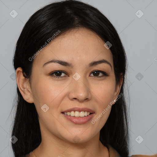 Joyful latino young-adult female with long  brown hair and brown eyes