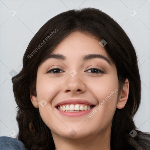 Joyful white young-adult female with long  black hair and brown eyes