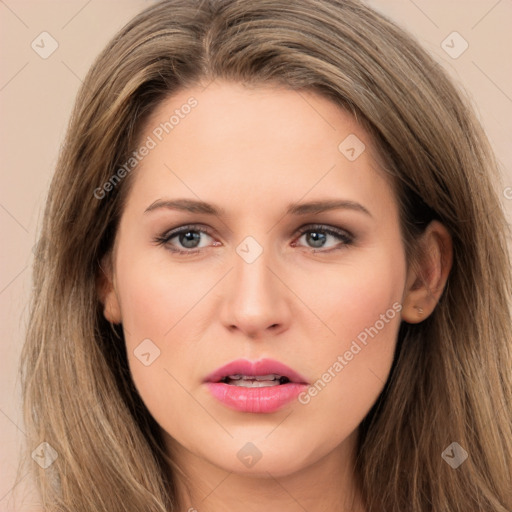 Joyful white young-adult female with long  brown hair and green eyes