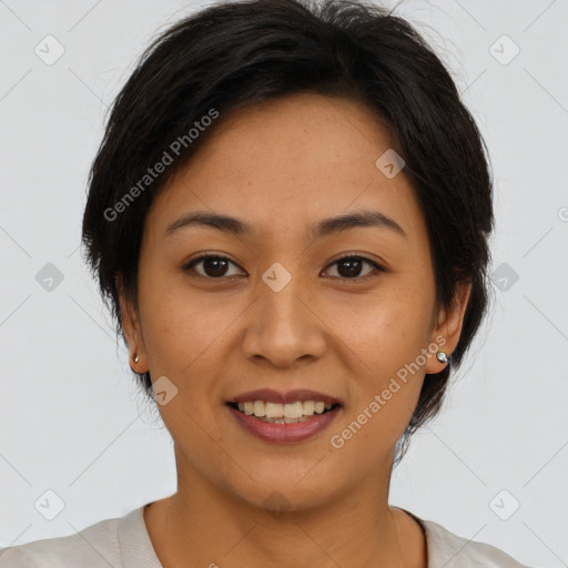 Joyful latino young-adult female with short  brown hair and brown eyes