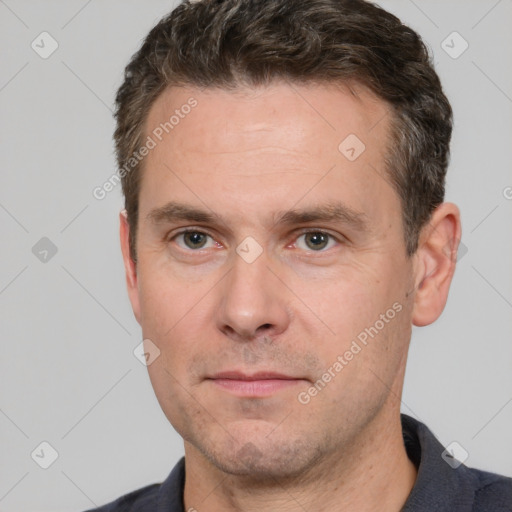 Neutral white adult male with short  brown hair and brown eyes