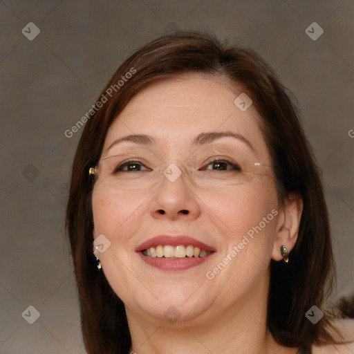 Joyful white adult female with medium  brown hair and brown eyes