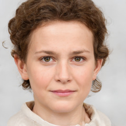 Joyful white young-adult female with medium  brown hair and green eyes