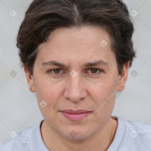 Joyful white adult female with short  brown hair and brown eyes