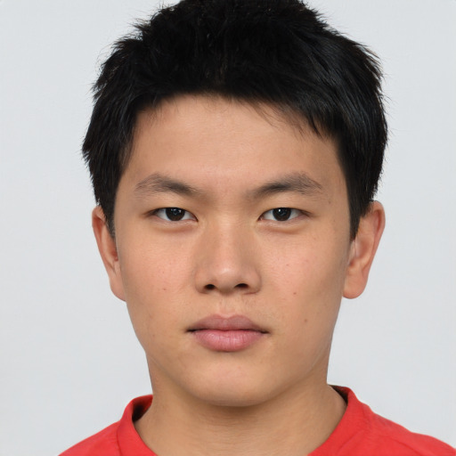 Neutral asian young-adult male with short  brown hair and brown eyes