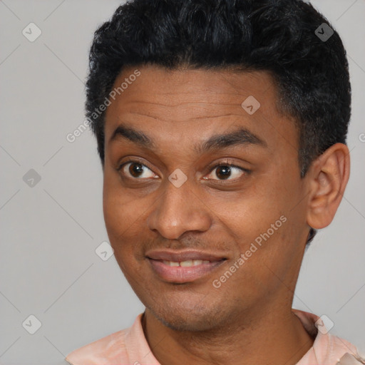 Joyful latino young-adult male with short  black hair and brown eyes