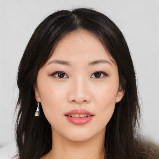 Neutral asian young-adult female with long  brown hair and brown eyes