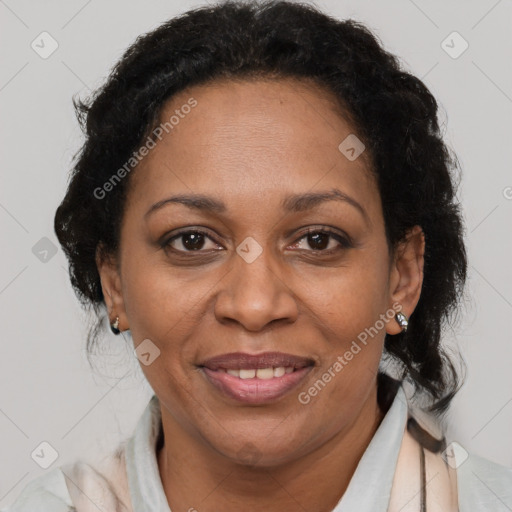 Joyful latino adult female with short  brown hair and brown eyes