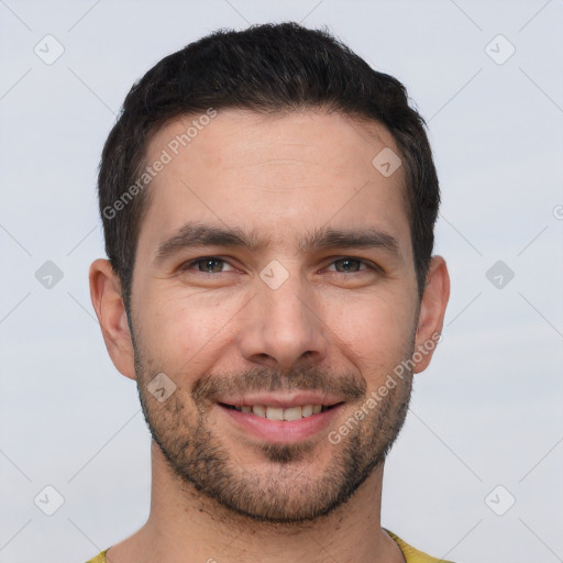 Joyful white young-adult male with short  brown hair and brown eyes