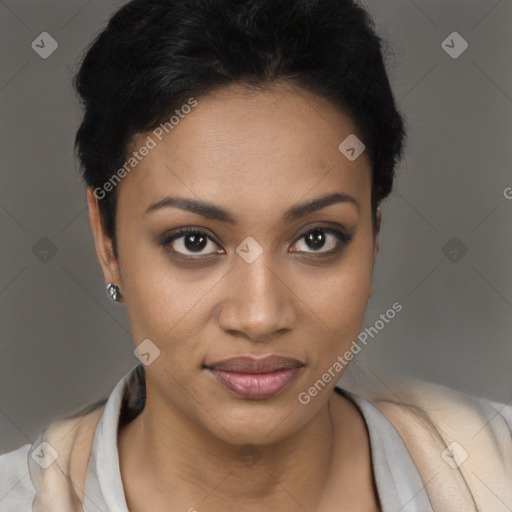 Joyful black young-adult female with short  black hair and brown eyes