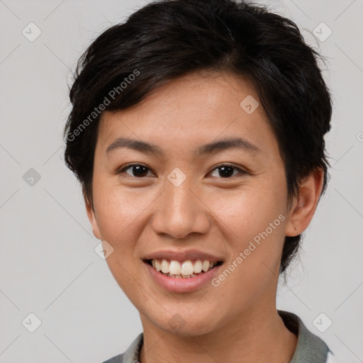 Joyful asian young-adult female with short  brown hair and brown eyes